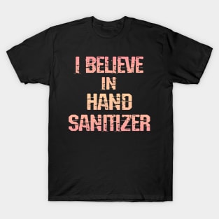 I believe in hand sanitizer. Wash your hands. Trust science, not morons. Trump lies matter. Stop the pandemic. Let's fight the virus together. Help flatten the curve 2020. T-Shirt